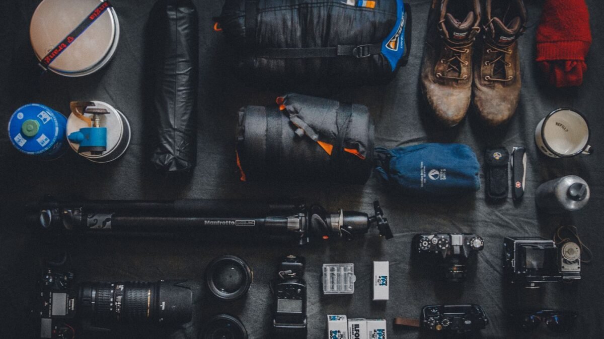 Complete Uganda safari packing list items including hiking boots and binoculars