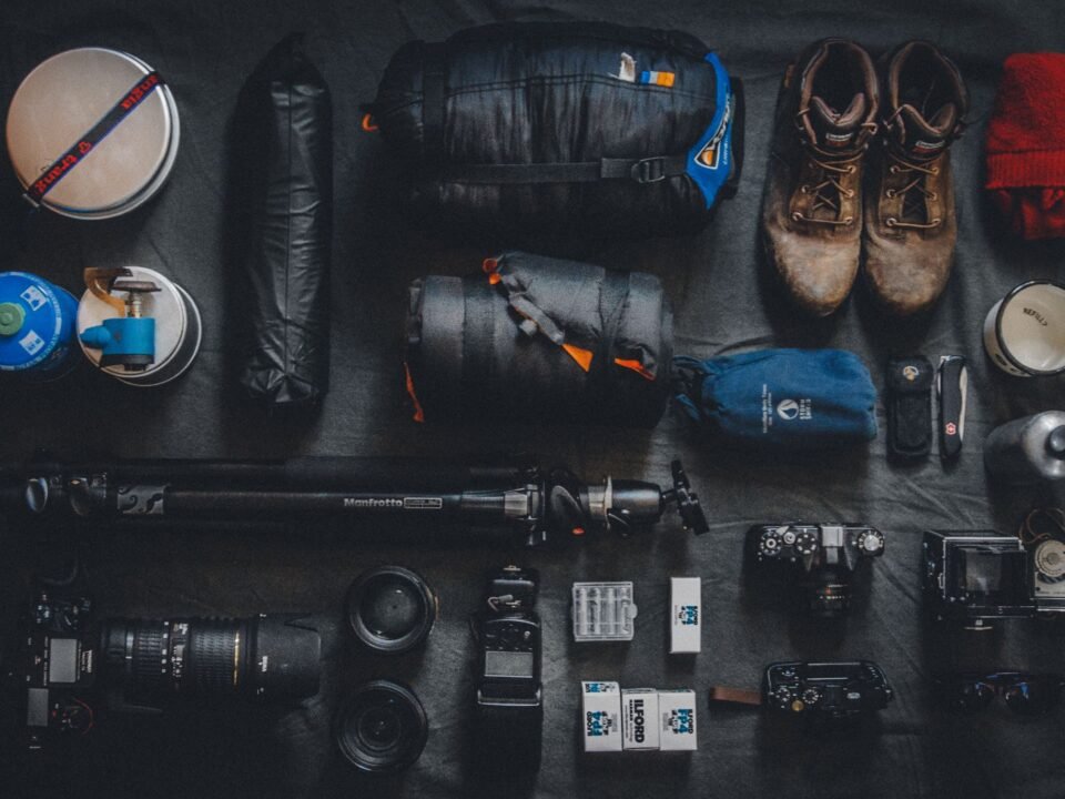 Complete Uganda safari packing list items including hiking boots and binoculars
